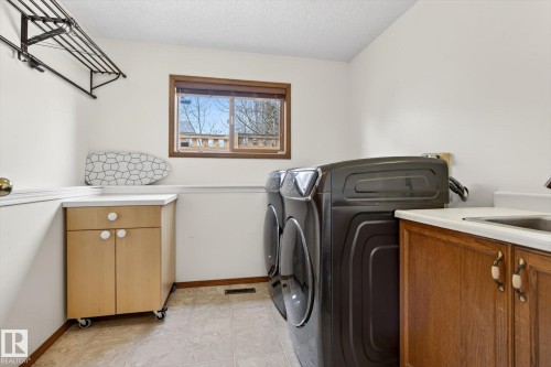3004 39 Avenue, Edmonton, AB - Indoor Photo Showing Laundry Room