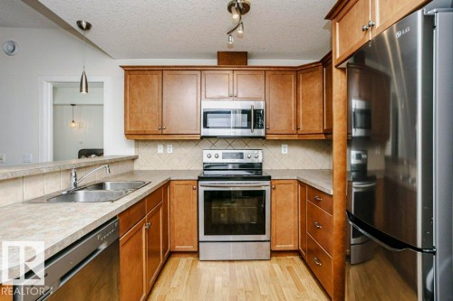 19 2565 Hanna Crescent, Edmonton, AB - Indoor Photo Showing Kitchen With Double Sink