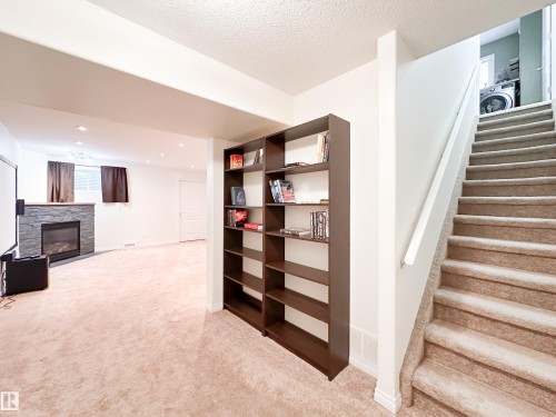34 Eastgate Way, St. Albert, AB - Indoor Photo Showing Other Room With Fireplace