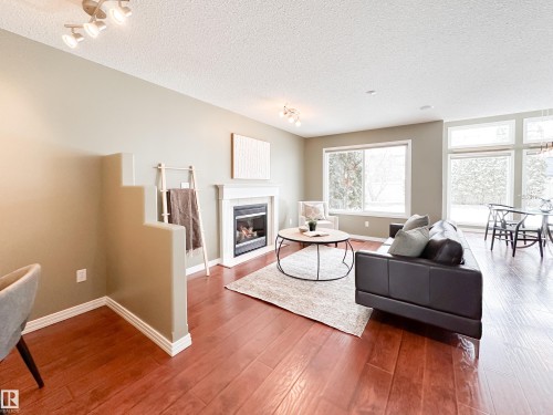 34 Eastgate Way, St. Albert, AB - Indoor Photo Showing Living Room With Fireplace