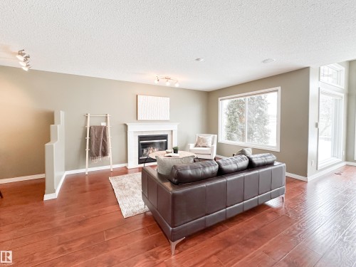 34 Eastgate Way, St. Albert, AB - Indoor Photo Showing Living Room With Fireplace