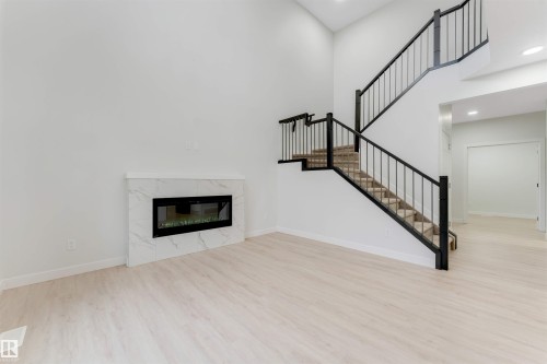 339 Roberts Wynd, Leduc, AB - Indoor With Fireplace