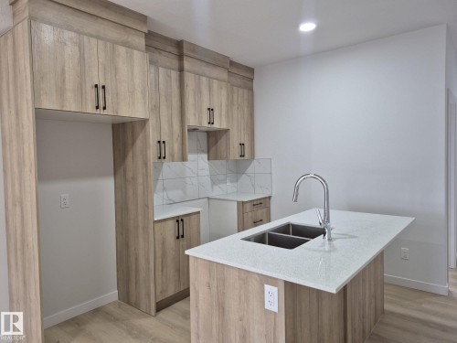 6379 King Wynd, Edmonton, AB - Indoor Photo Showing Kitchen With Double Sink