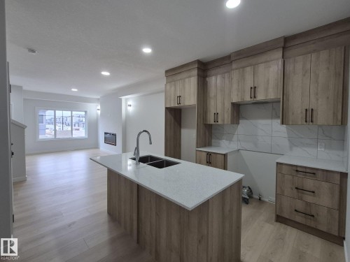 6379 King Wynd, Edmonton, AB - Indoor Photo Showing Kitchen With Double Sink