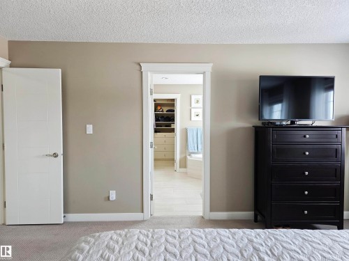 This room features light-colored walls and carpeted flooring - 76 Newgate Way, St. Albert, AB - Indoor Photo Showing Bedroom