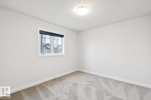 323 Avena Link, Leduc, AB - Indoor Photo Showing Other Room