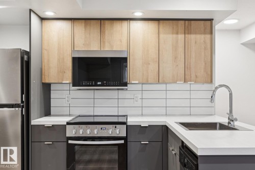 323 Avena Link, Leduc, AB - Indoor Photo Showing Kitchen With Upgraded Kitchen