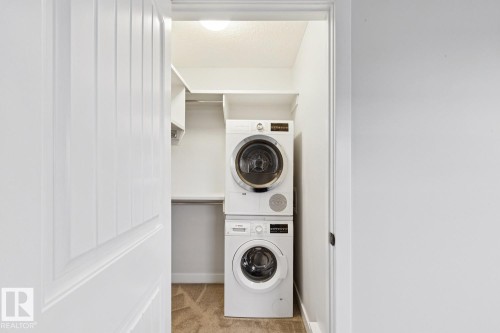 323 Avena Link, Leduc, AB - Indoor Photo Showing Laundry Room