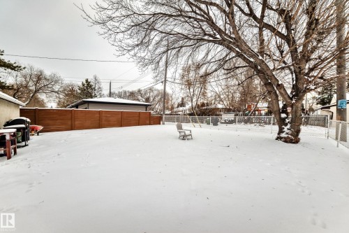 Yard covered in snow featuring a fenced backyard - 15515 92A Avenue, Edmonton, AB - Outdoor
