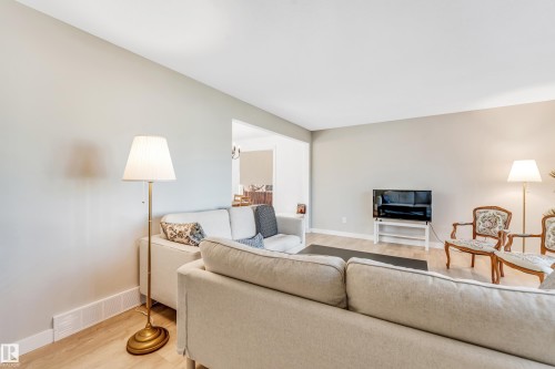 2404 80 Street, Edmonton, AB - Indoor Photo Showing Living Room With Fireplace