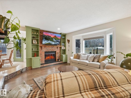 5609 56A Street, Beaumont, AB - Indoor Photo Showing Living Room With Fireplace