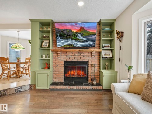5609 56A Street, Beaumont, AB - Indoor Photo Showing Living Room With Fireplace