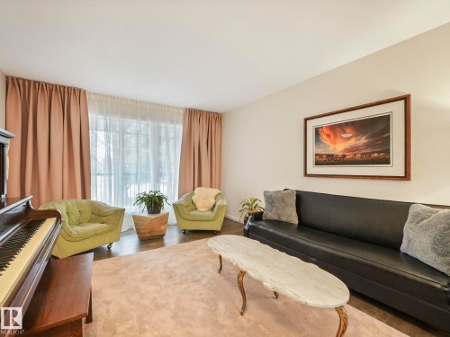 5609 56A Street, Beaumont, AB - Indoor Photo Showing Living Room