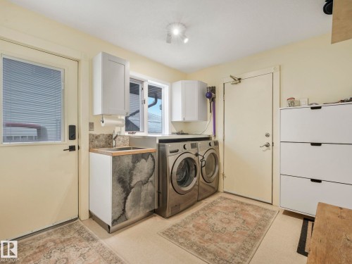 5609 56A Street, Beaumont, AB - Indoor Photo Showing Laundry Room