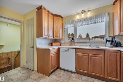 8649 27 Avenue, Edmonton, AB - Indoor Photo Showing Kitchen With Double Sink