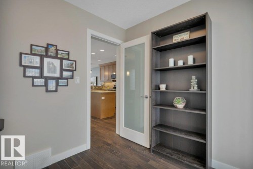 This office has patio doors leading to the rear deck. - 9540 142 Street, Edmonton, AB - Indoor Photo Showing Other Room