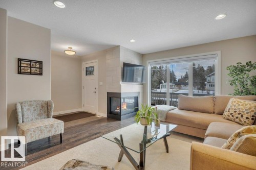 9540 142 Street, Edmonton, AB - Indoor Photo Showing Living Room With Fireplace