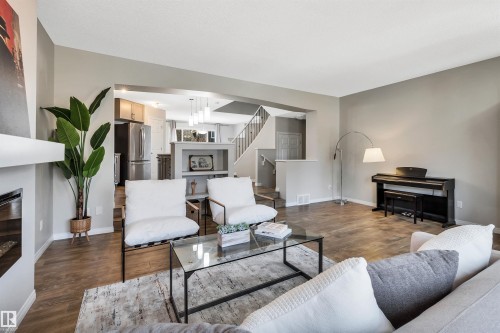 1271 Chappelle Boulevard, Edmonton, AB - Indoor Photo Showing Living Room With Fireplace