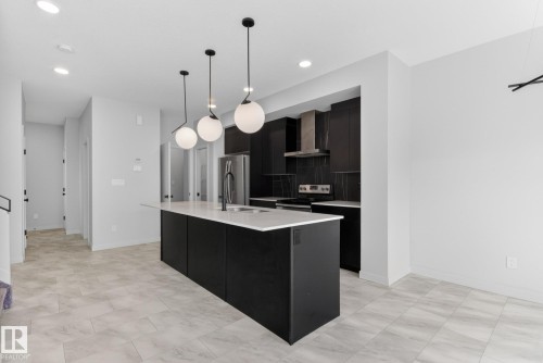 107 Garneau Gate, Spruce Grove, AB - Indoor Photo Showing Kitchen With Upgraded Kitchen