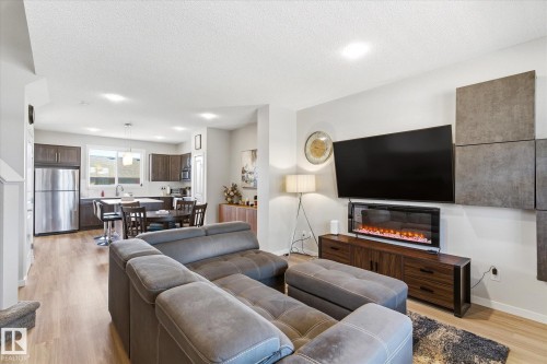 1208 Rosenthal Boulevard, Edmonton, AB - Indoor Photo Showing Living Room With Fireplace