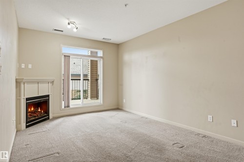 139 2503 Hanna Crescent, Edmonton, AB - Indoor With Fireplace