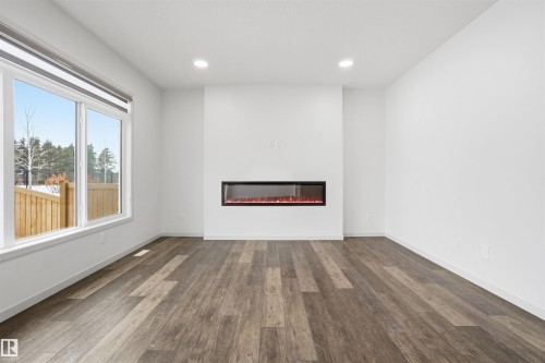 3420 Checknita Terrace, Edmonton, AB - Indoor With Fireplace