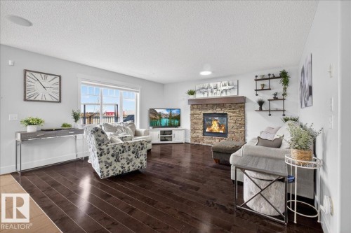 8132 16A Avenue, Edmonton, AB - Indoor Photo Showing Living Room With Fireplace