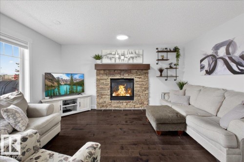 8132 16A Avenue, Edmonton, AB - Indoor Photo Showing Living Room With Fireplace