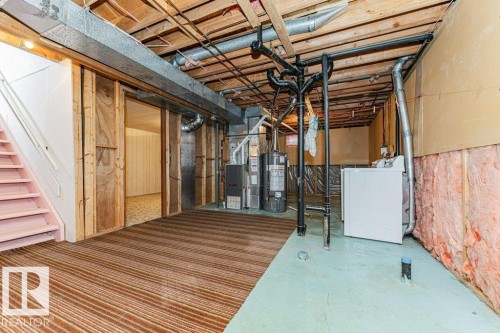 The property features a utility area with exposed ceiling joists, ductwork, and plumbing - 8804 19 Avenue, Edmonton, AB - Indoor Photo Showing Basement