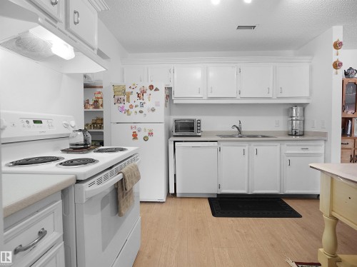 156 2703 79 Street, Edmonton, AB - Indoor Photo Showing Kitchen With Double Sink