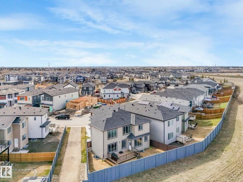The property is situated within a developed residential area with a range of housing styles - 1104 152 Avenue, Edmonton, AB - Outdoor With View