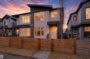 The property presents a contemporary exterior design with a contrasting dark and light facade - 9612 72 Avenue, Edmonton, AB  - Outdoor With Facade 