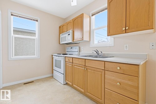 8139 79 Avenue, Edmonton, AB - Indoor Photo Showing Kitchen With Double Sink