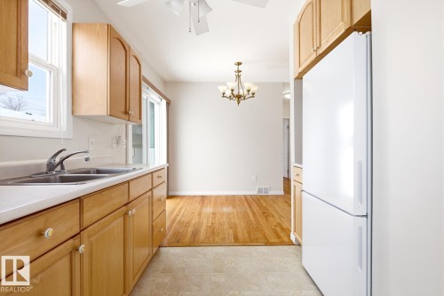8139 79 Avenue, Edmonton, AB - Indoor Photo Showing Kitchen With Double Sink