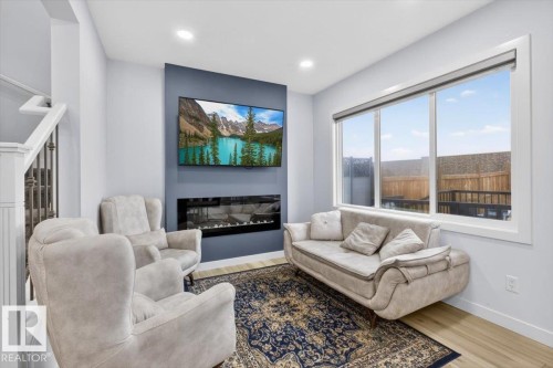 3173 Checknita Way, Edmonton, AB - Indoor Photo Showing Living Room With Fireplace