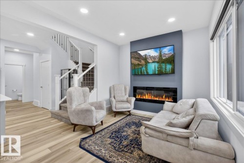 3173 Checknita Way, Edmonton, AB - Indoor Photo Showing Living Room With Fireplace