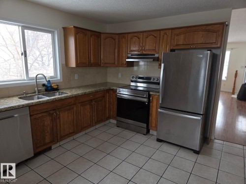 6520 154 Avenue, Edmonton, AB - Indoor Photo Showing Kitchen With Double Sink