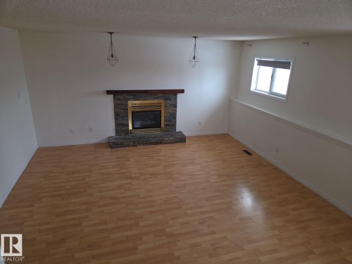6520 154 Avenue, Edmonton, AB - Indoor Photo Showing Living Room With Fireplace