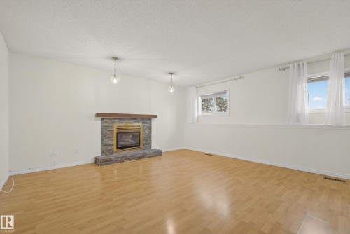 6520 154 Avenue, Edmonton, AB - Indoor Photo Showing Living Room With Fireplace