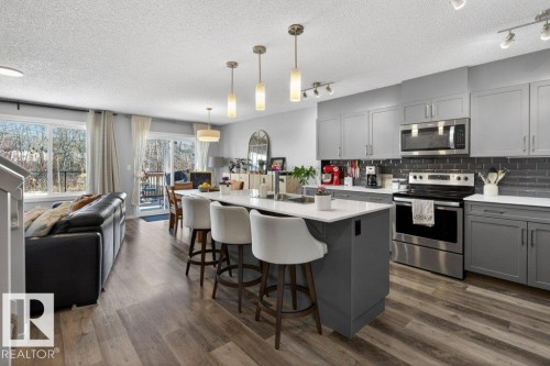 29 Harness Link, Ardrossan, AB - Indoor Photo Showing Kitchen With Stainless Steel Kitchen