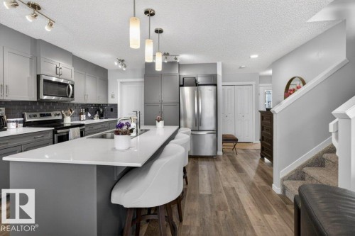 29 Harness Link, Ardrossan, AB - Indoor Photo Showing Kitchen With Stainless Steel Kitchen With Upgraded Kitchen
