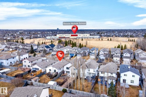 Aerial view of the neighborhood showcasing surrounding properties and a nearby school - 20147 48 Avenue, Edmonton, AB - Outdoor With View