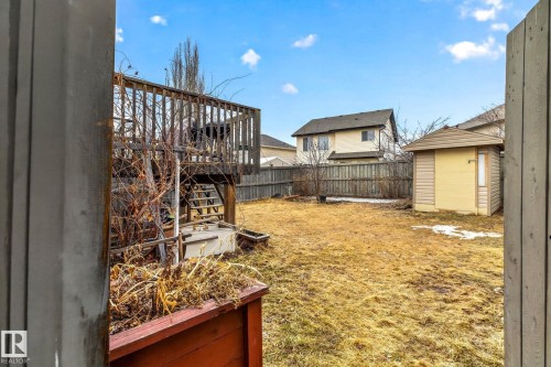 The property features a fenced yard with a wooden deck and a shed - 20147 48 Avenue, Edmonton, AB - Outdoor With Exterior