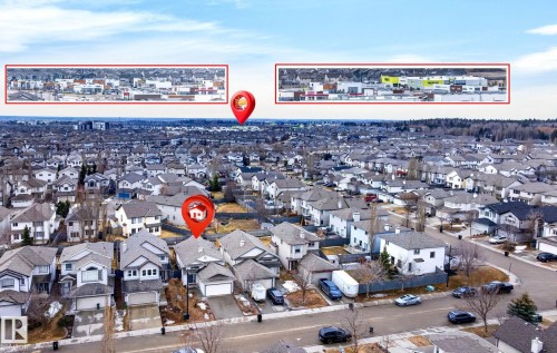 Aerial view of the surrounding neighborhood, featuring residential properties with grey roofs and varied architectural styles - 20147 48 Avenue, Edmonton, AB - Outdoor With View