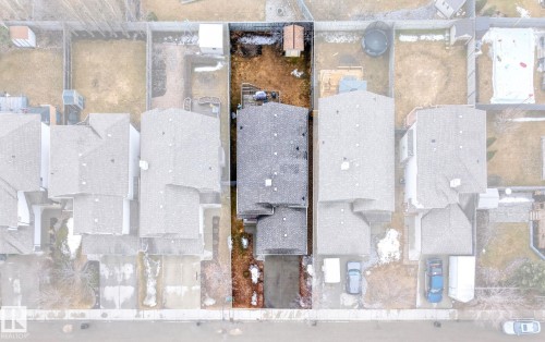 Aerial view of the property, showcasing the roofline, driveway, and rear yard - 20147 48 Avenue, Edmonton, AB - Other