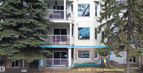 The property features a private ground-level patio with white railings, offering direct outdoor access - 31 9914 80 Avenue, Edmonton, AB - Outdoor With Balcony