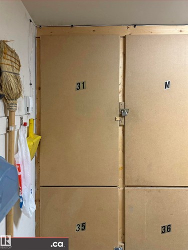 Storage lockers with visible numbering provide organized storage solutions - 31 9914 80 Avenue, Edmonton, AB - Indoor