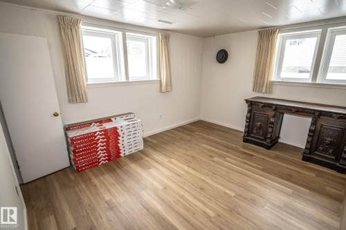 This room features light-colored flooring and white walls, creating a bright atmosphere - 5209 49 Ave, St. Paul Town, AB - Indoor