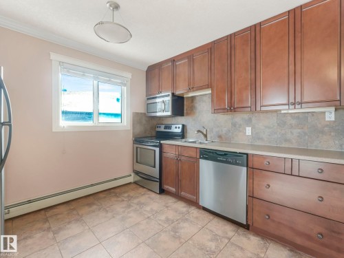 9 10724 115 Street, Edmonton, AB - Indoor Photo Showing Kitchen With Stainless Steel Kitchen