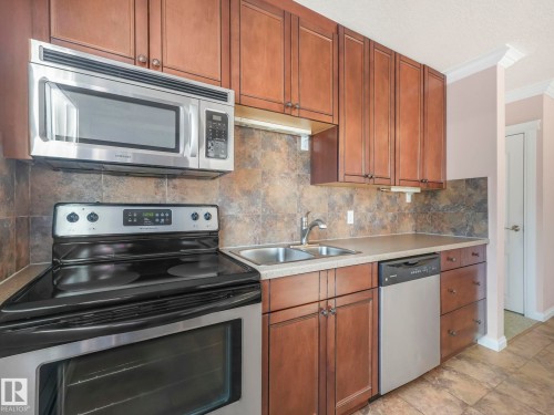 9 10724 115 Street, Edmonton, AB - Indoor Photo Showing Kitchen With Double Sink